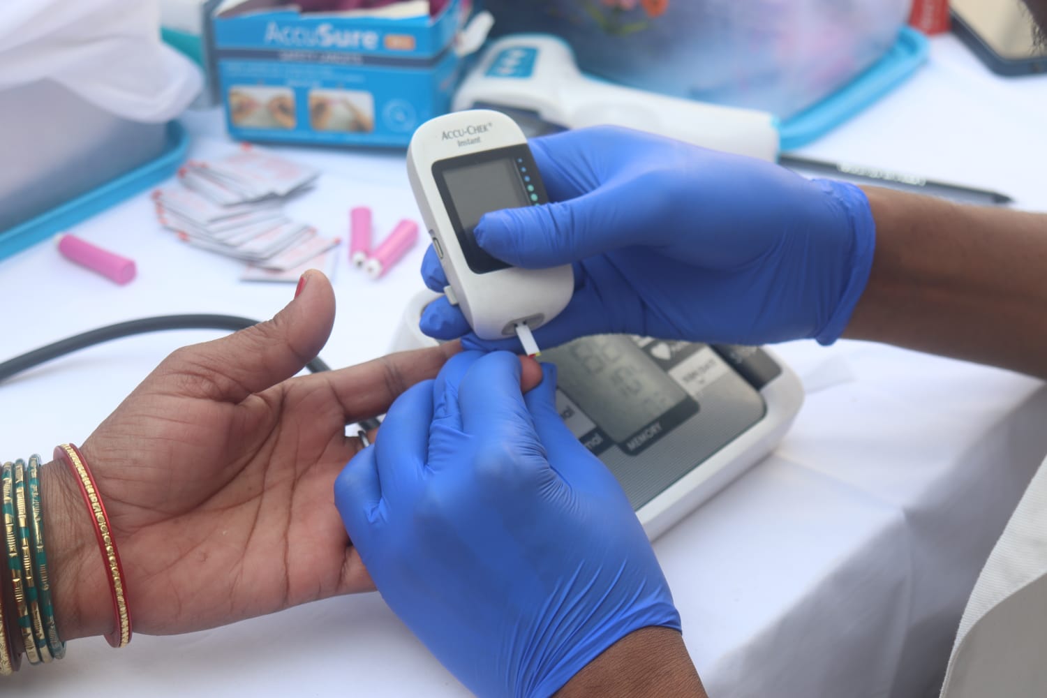 Blood test being conducted at SPHC health camp